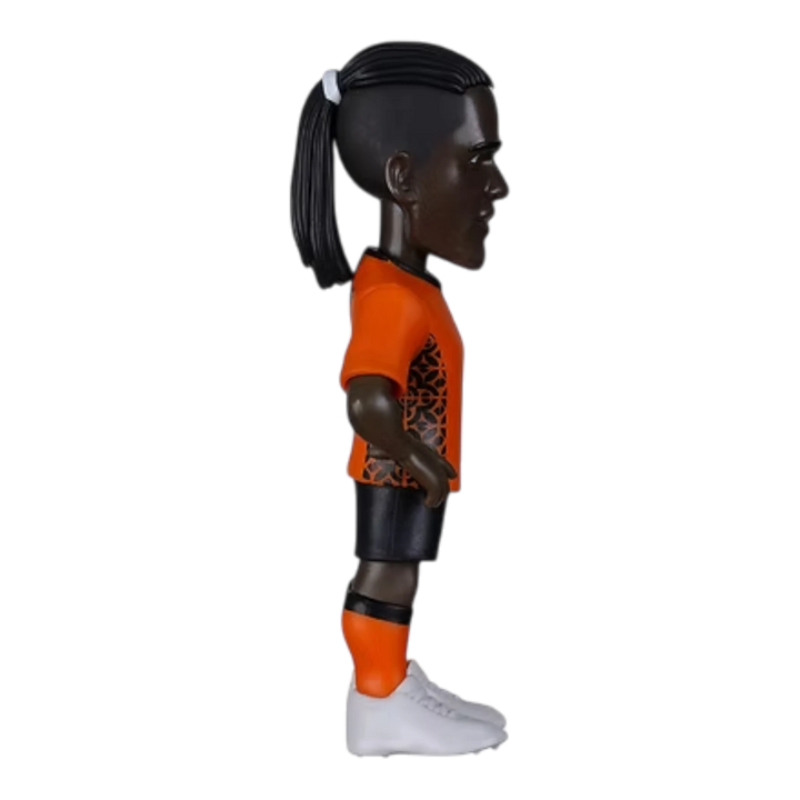 HypeSelection Minix Clarence Seedorf Netherlands collectible figure in orange kit with ponytail, side profile view.