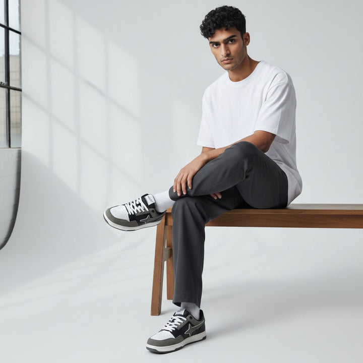 HypeSelection Comet X Lows Greyscale sneakers with white, black, and grey suede panels and a star logo.