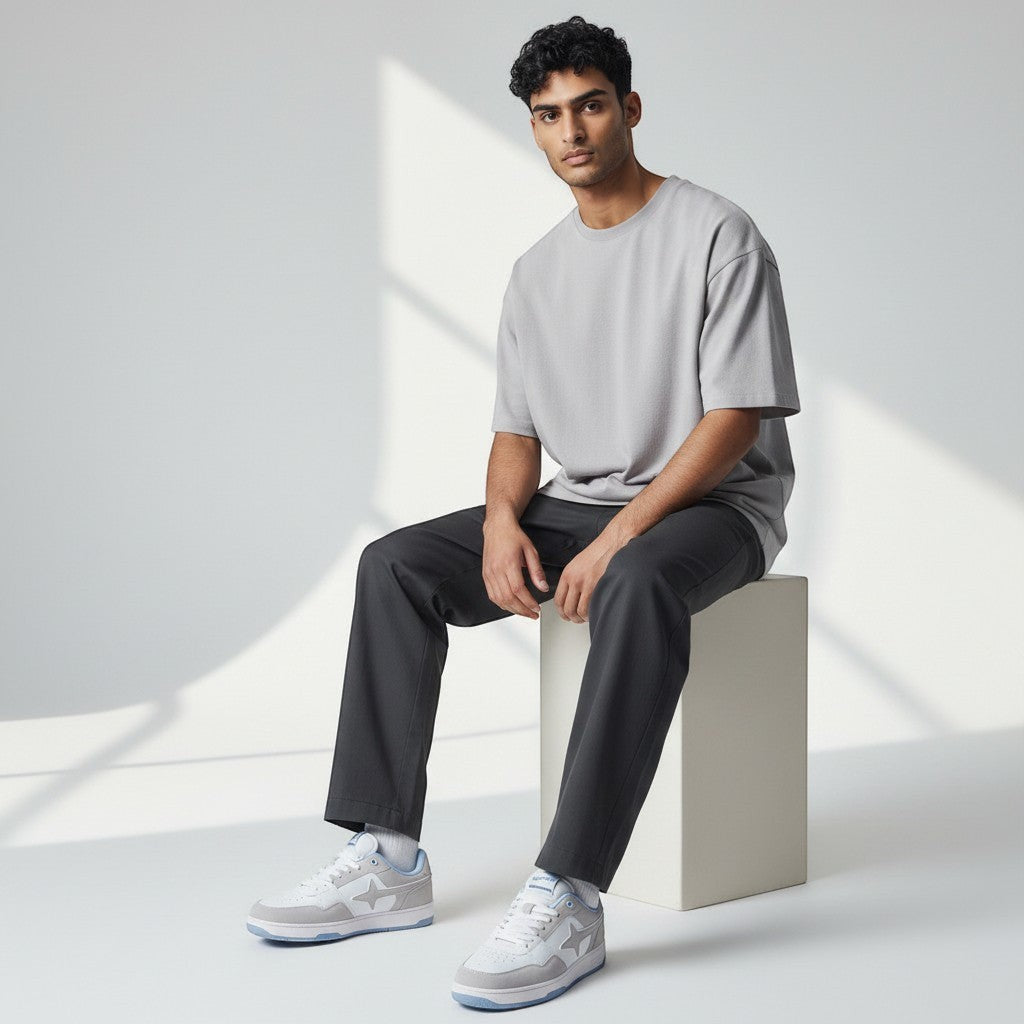 HypeSelection Comet X Lows Snow sneakers in white, grey, and light blue. Faux leather and suede upper with a star logo. Comfortable rubber sole.