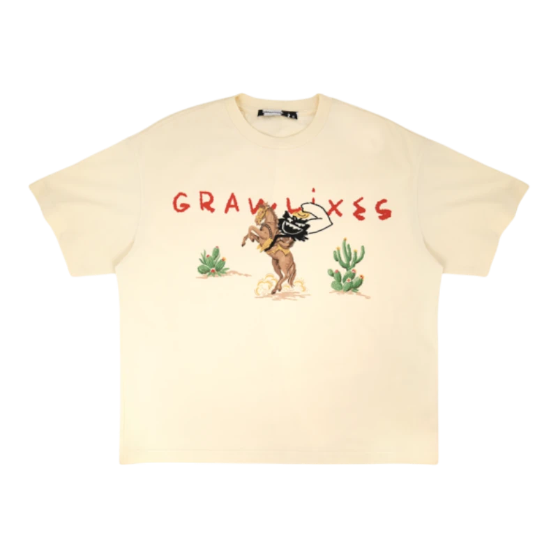 HypeSelection sand 100% cotton relaxed fit t-shirt with 'Cowboy Abaddon' graphic featuring a cowboy on a horse and cacti.