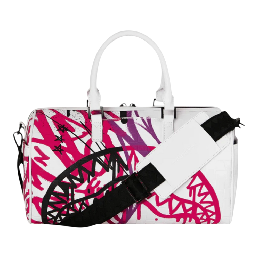 HypeSelection white mini duffle bag with pink and purple graffiti-style shark mouth graphic and black strap.