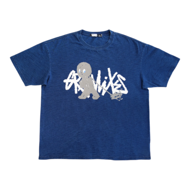HypeSelection Grawlixes indigo-dyed slub cotton t-shirt with a textured blue finish and graphic print on the chest.