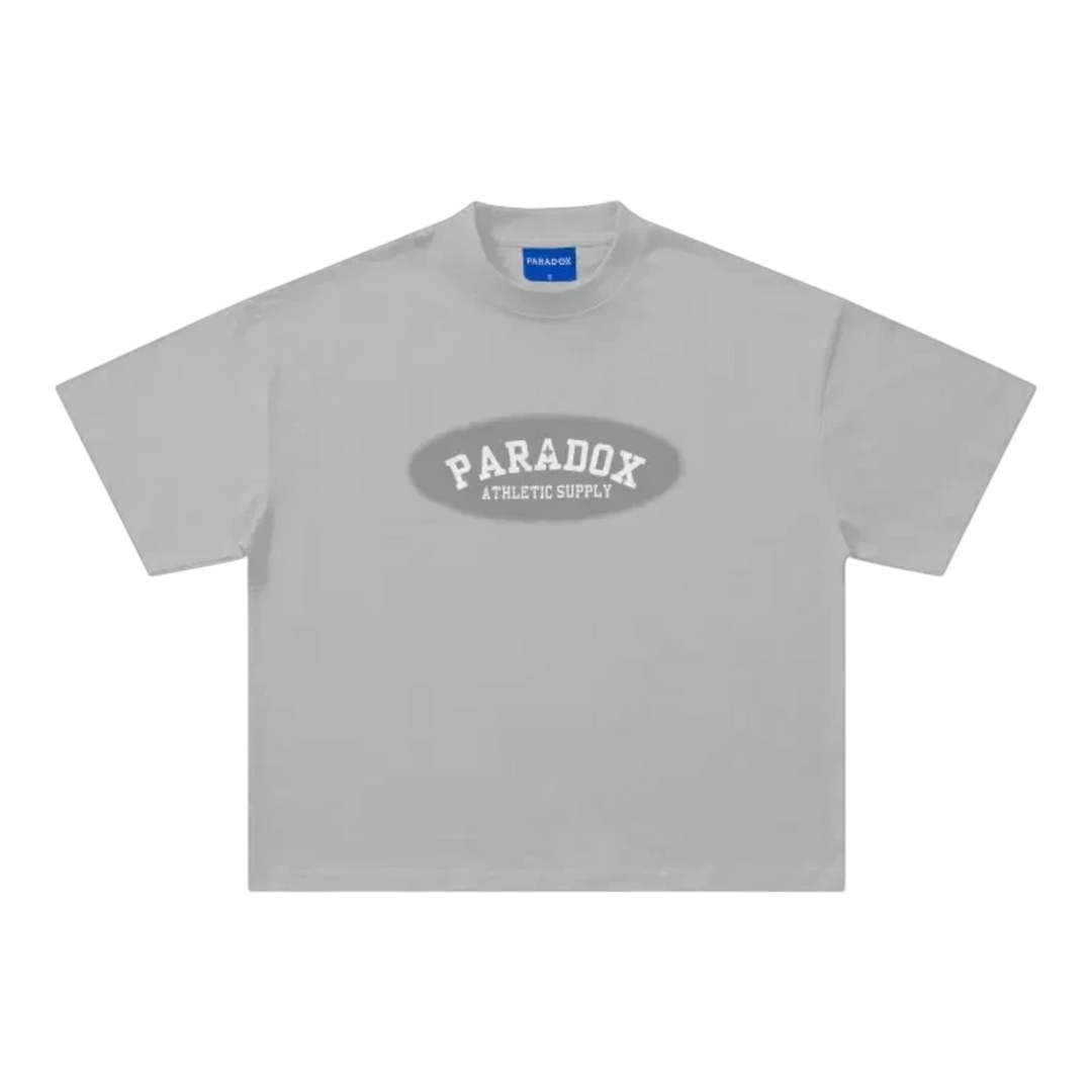 HypeSelection grey 100% cotton boxy oversized t-shirt with faded oval chest graphic and varsity-style branding.