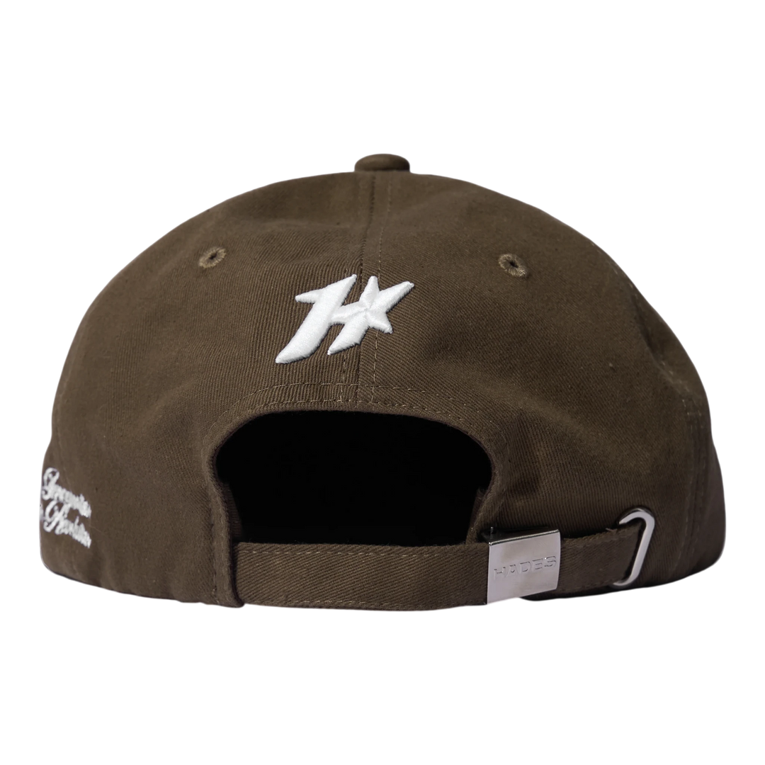 HypeSelection brown Jean Khaki snapback cap with white embroidered HADES logo and metal adjustable closure.