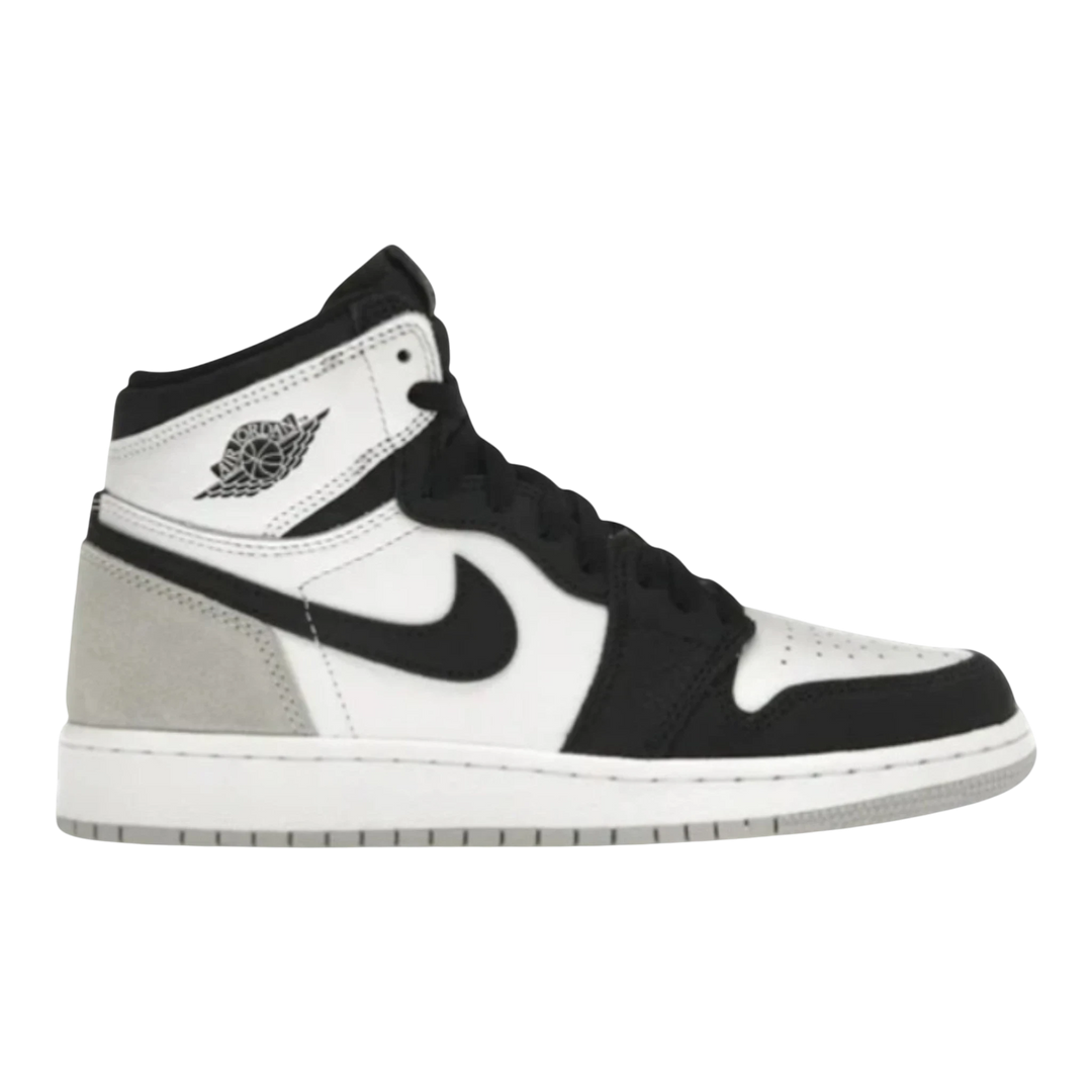 HypeSelection Jordan 1 Retro High OG GS in white, black, and grey with suede overlays and subtle coral accents.