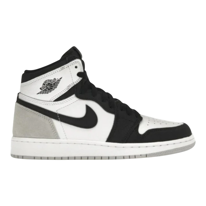 HypeSelection Jordan 1 Retro High OG GS in white, black, and grey with suede overlays and subtle coral accents.