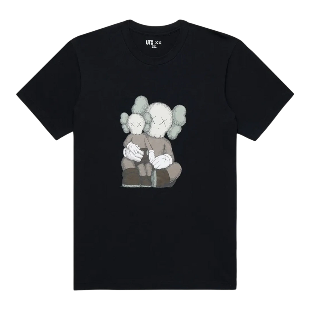HypeSelection black cotton short sleeve t-shirt with KAWS x Uniqlo graphic print of two characters hugging.