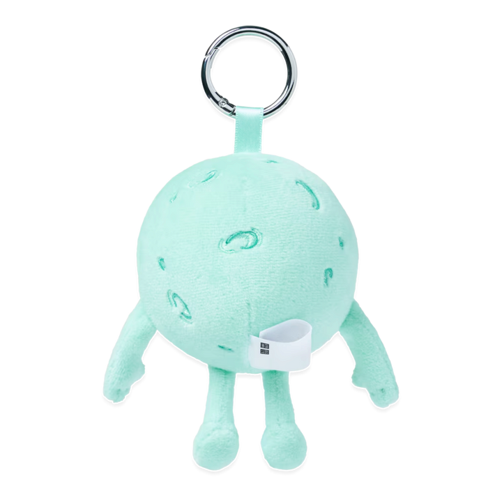 HypeSelection KAWS Universe Moon plush charm in light green with a silver keyring for bags and accessories.
