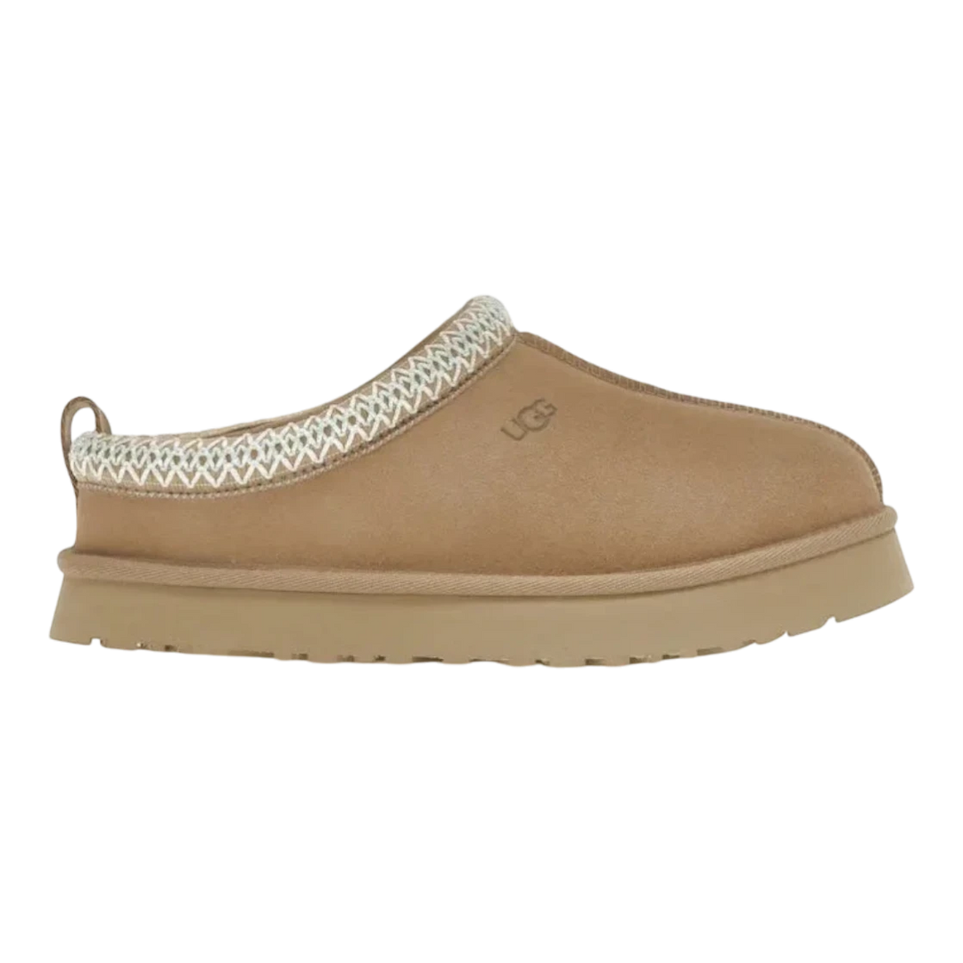 HypeSelection Kids UGG Tazz slipper in sand suede with UGGbraid detail and platform sole.