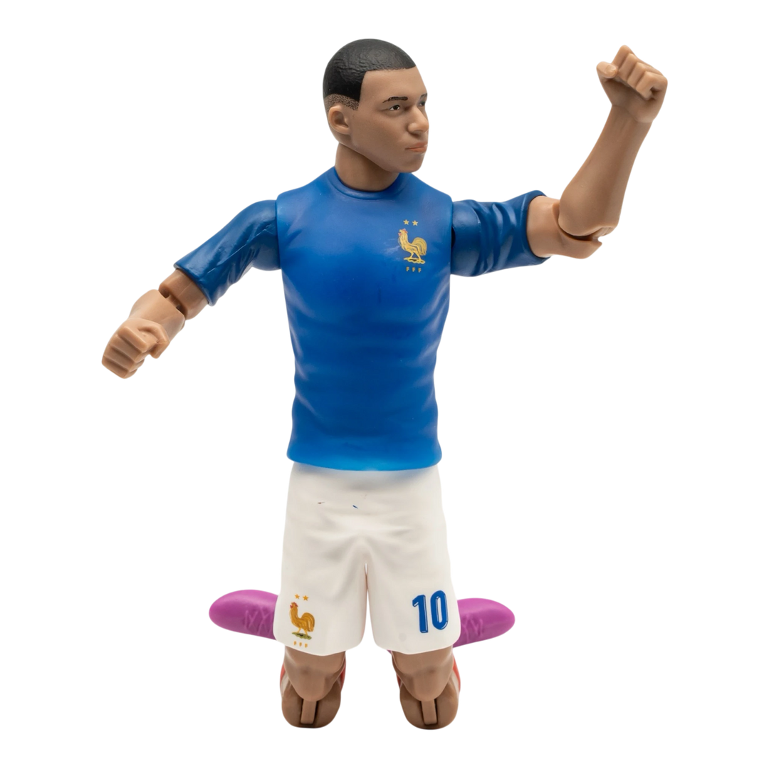 HypeSelection 20cm Kylian Mbappé action figure in France blue kit with articulation, isolated on black background.
