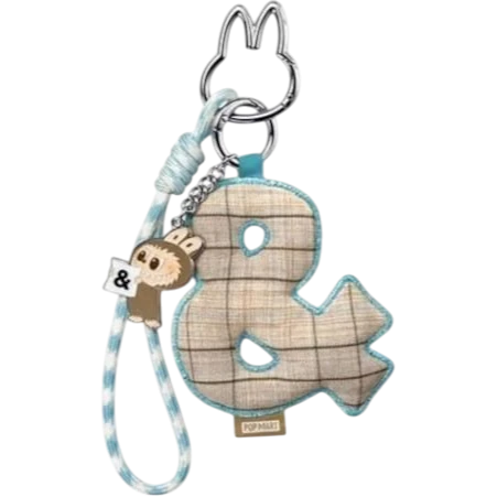 HypeSelection Pop Mart Labubu '&' letter pendant with plaid fabric and a small character charm, attached to a keychain.