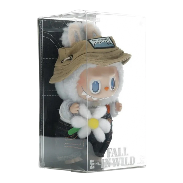 HypeSelection Labubu Fall In Wild plush pendant with vinyl face, wearing denim overalls, bucket hat, and holding a daisy.