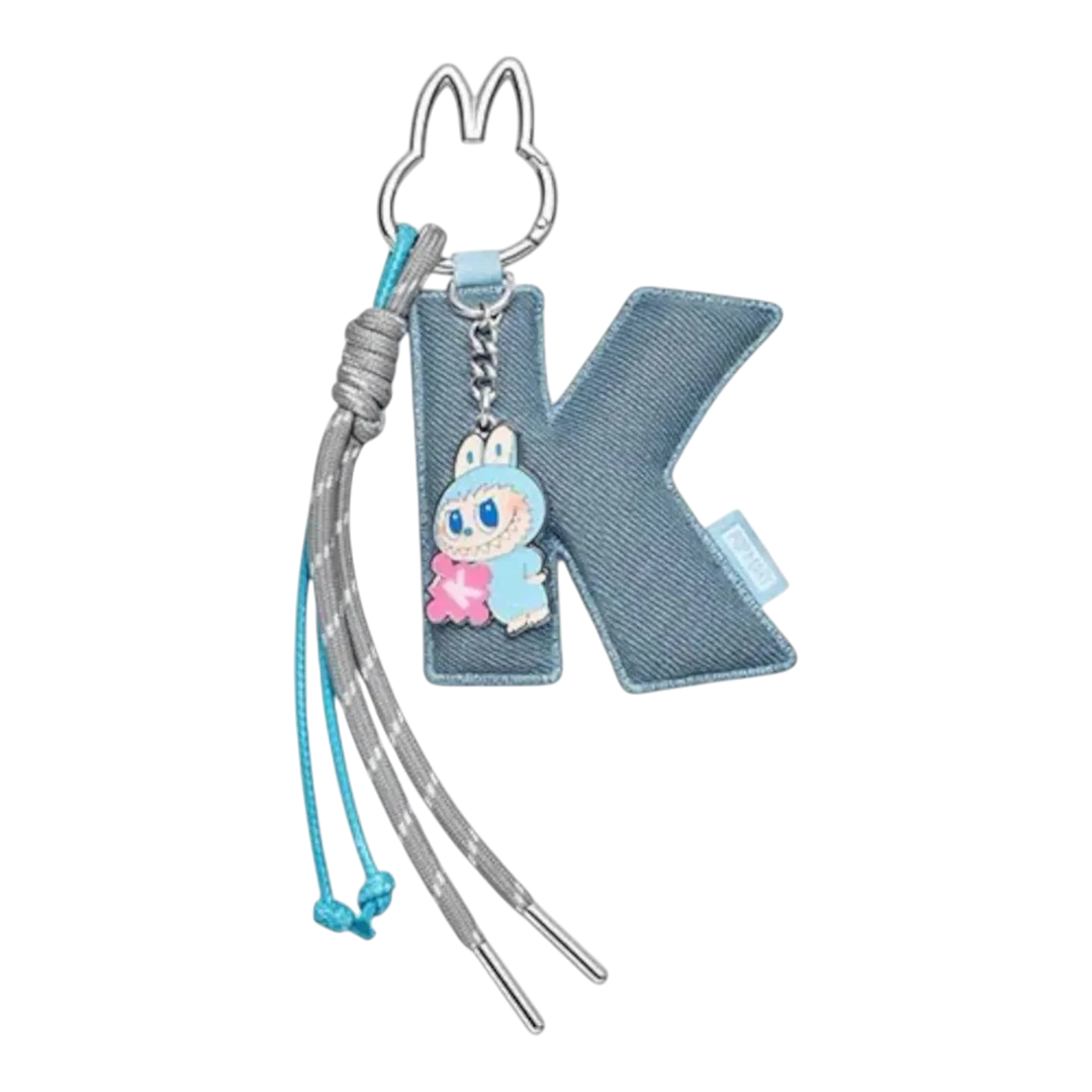HypeSelection Pop Mart Labubu K letter pendant with blue denim finish and a small blue character charm. Features a grey and blue cord.