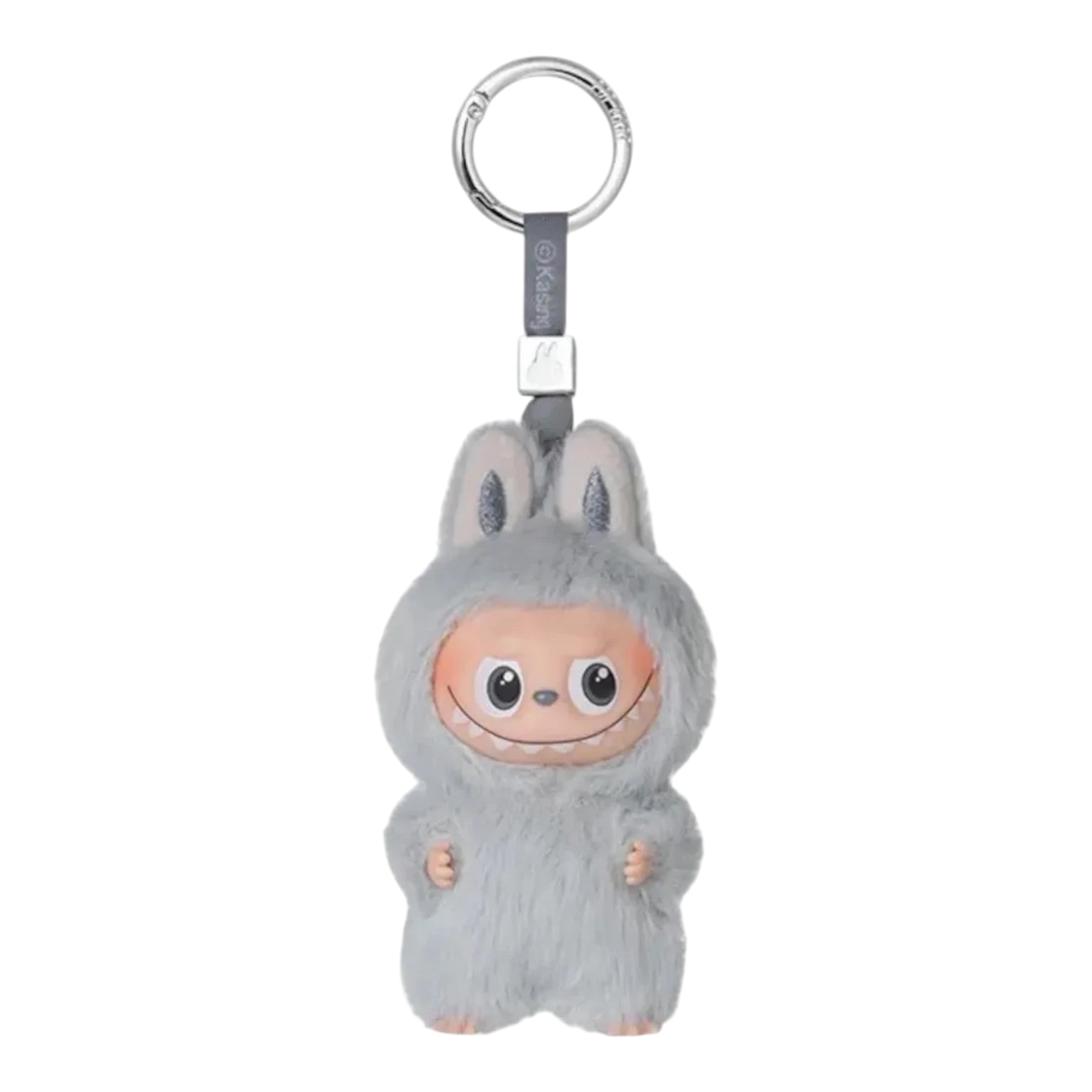 HypeSelection grey fuzzy Labubu monster plush pendant with vinyl face and bunny ears, attached to a keyring.