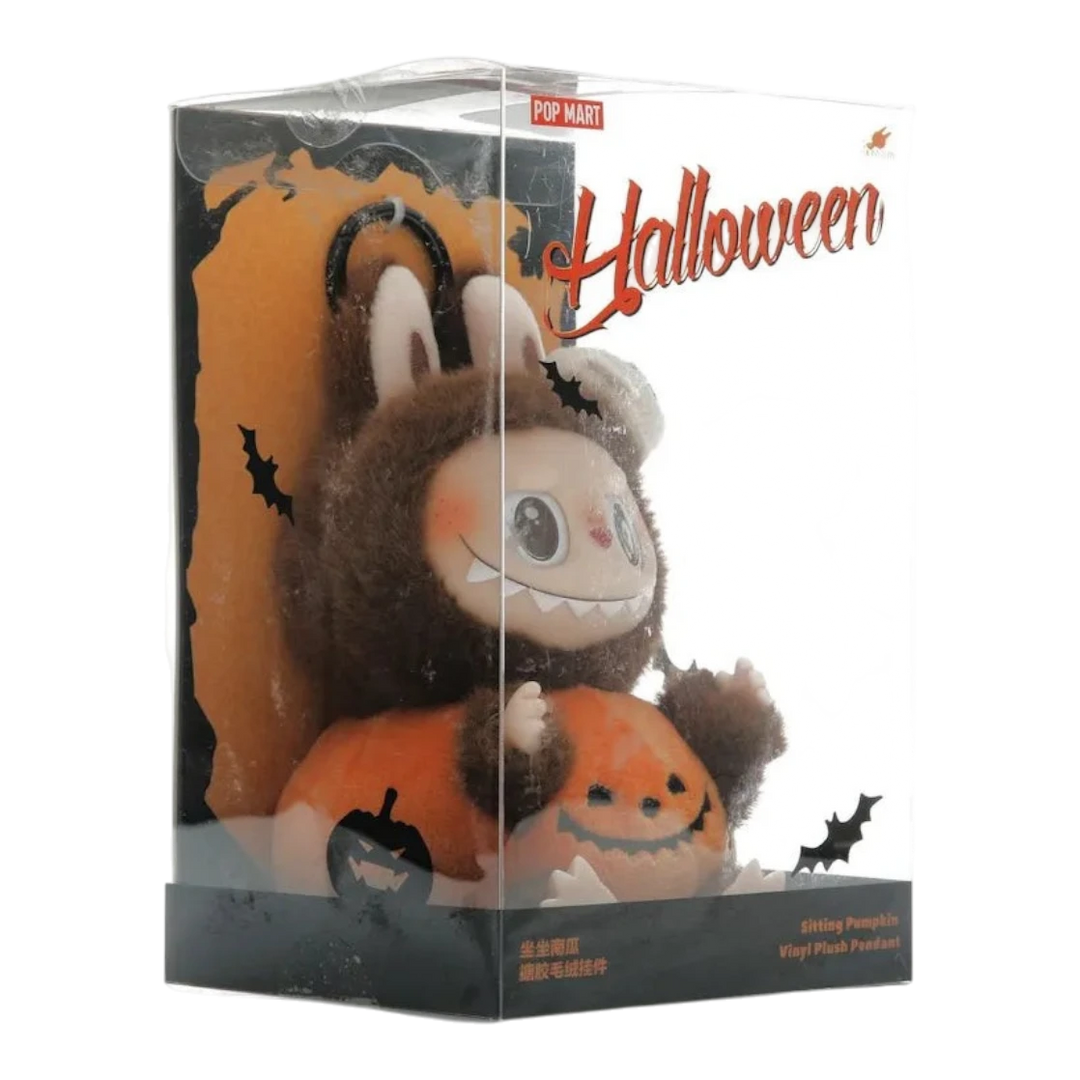 HypeSelection Pop Mart Labubu Sitting Pumpkin Halloween vinyl plush pendant with brown fur and orange pumpkin details.