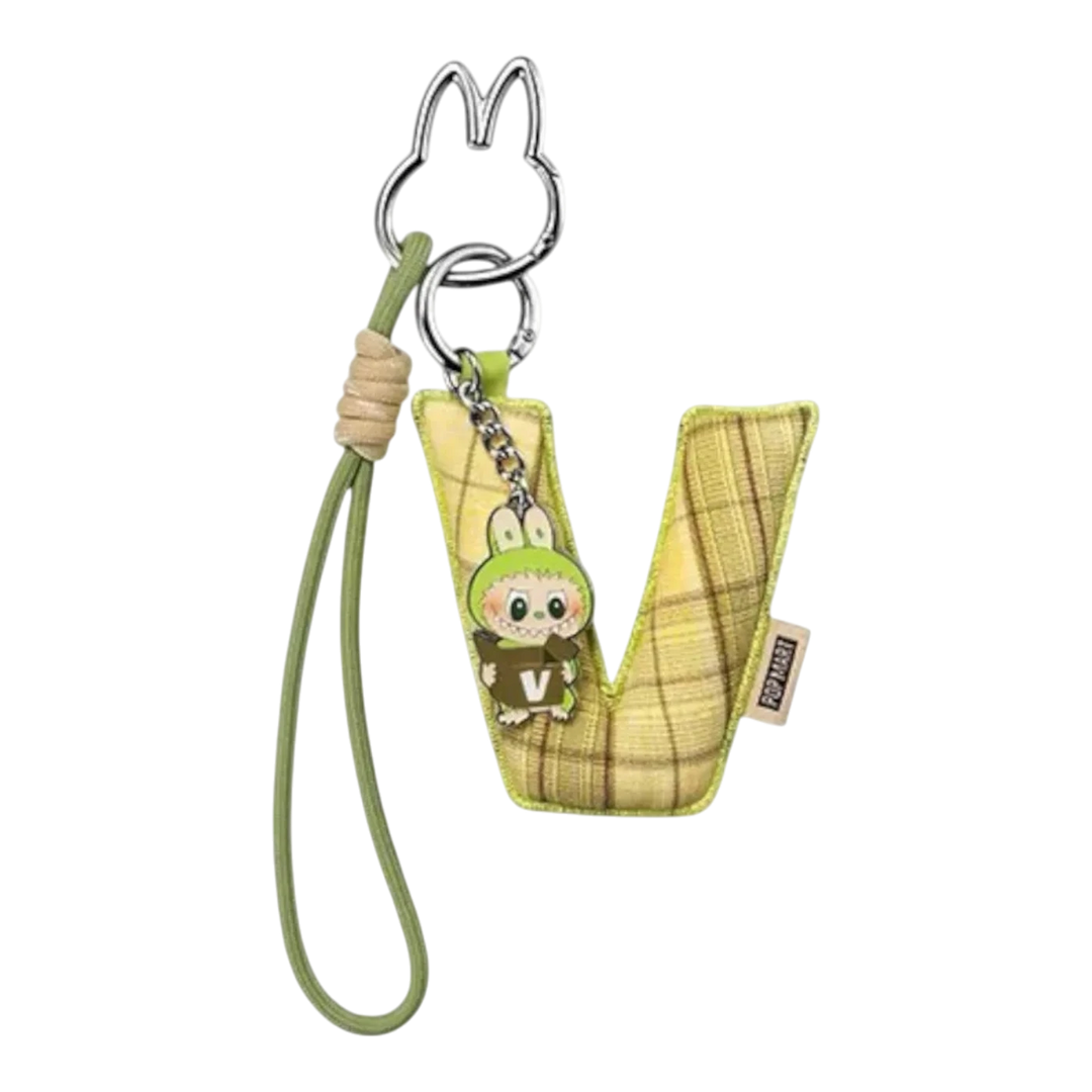 HypeSelection Pop Mart Labubu "V" letter pendant keychain with plaid yellow fabric and a small character charm.