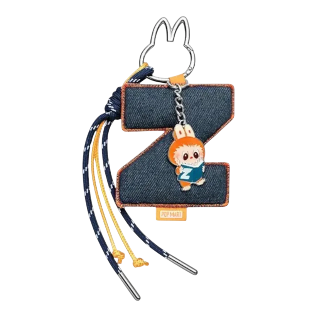 HypeSelection Pop Mart Labubu Z letter pendant with denim finish and plush toy charm, featuring blue and yellow cords.