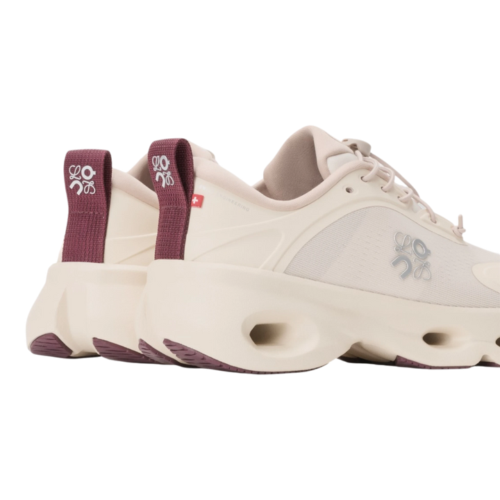 HypeSelection LOEWE x On Cloudsolo sneakers in sand and burgundy with signature heel pebble toggle and CloudTec cushioning.