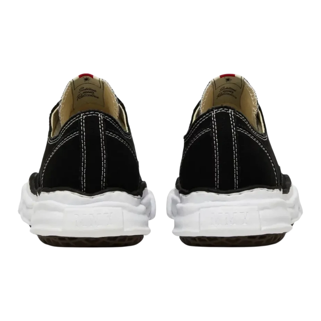 Maison Mihara Yasuhiro Peterson OG Sole black canvas low-top sneakers with white stitching and chunky white rubber sole.