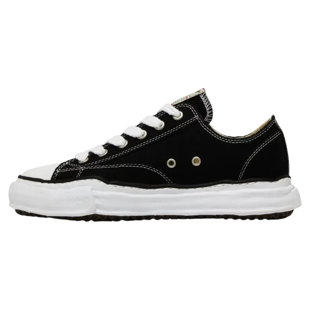 Maison Mihara Yasuhiro Peterson OG Sole black canvas low-top sneakers with white stitching and laces.