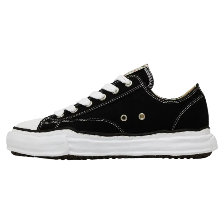 Maison Mihara Yasuhiro Peterson OG Sole black canvas low-top sneakers with white stitching and laces.