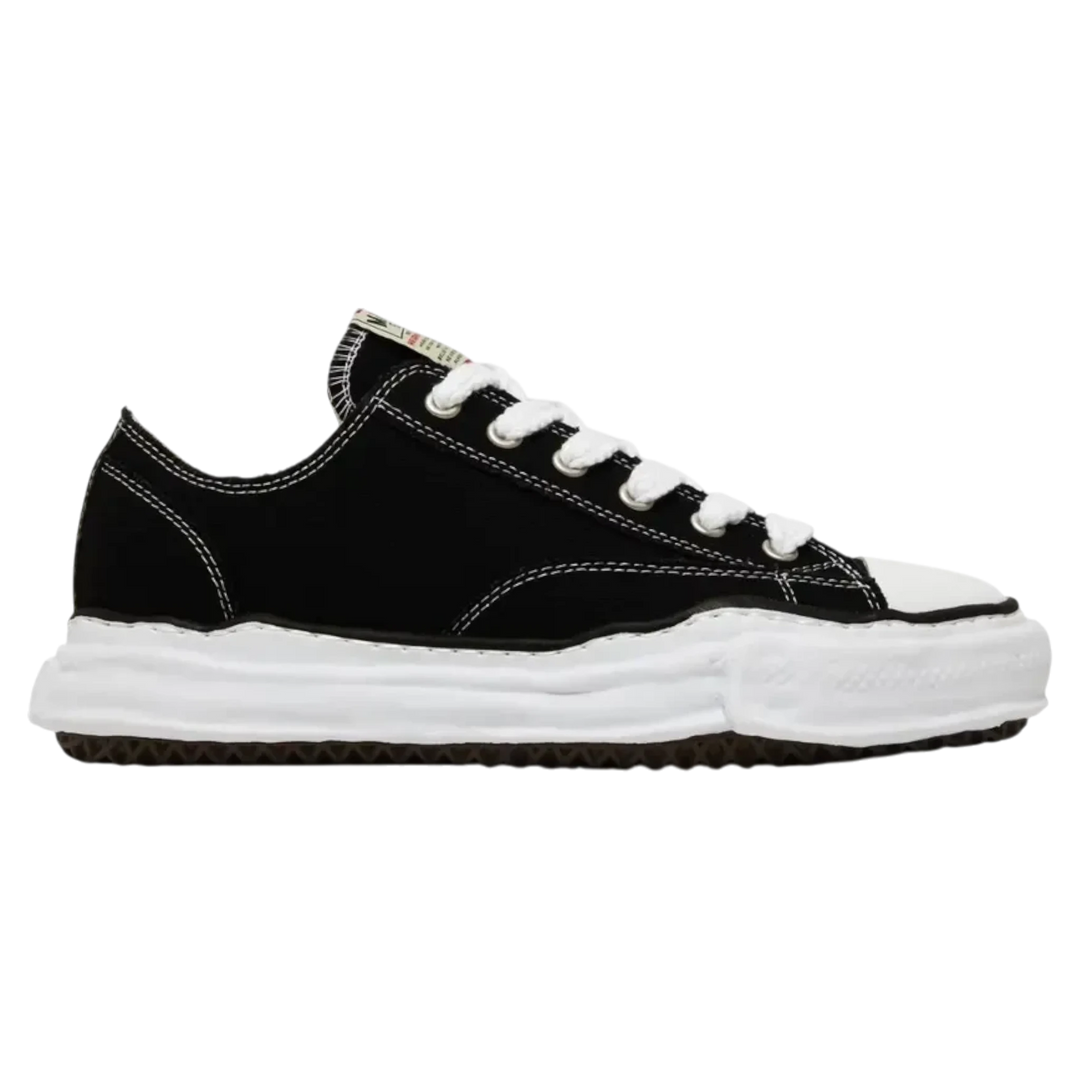 Maison Mihara Yasuhiro Peterson OG Sole black canvas low-top sneakers with white stitching and a chunky white rubber sole.