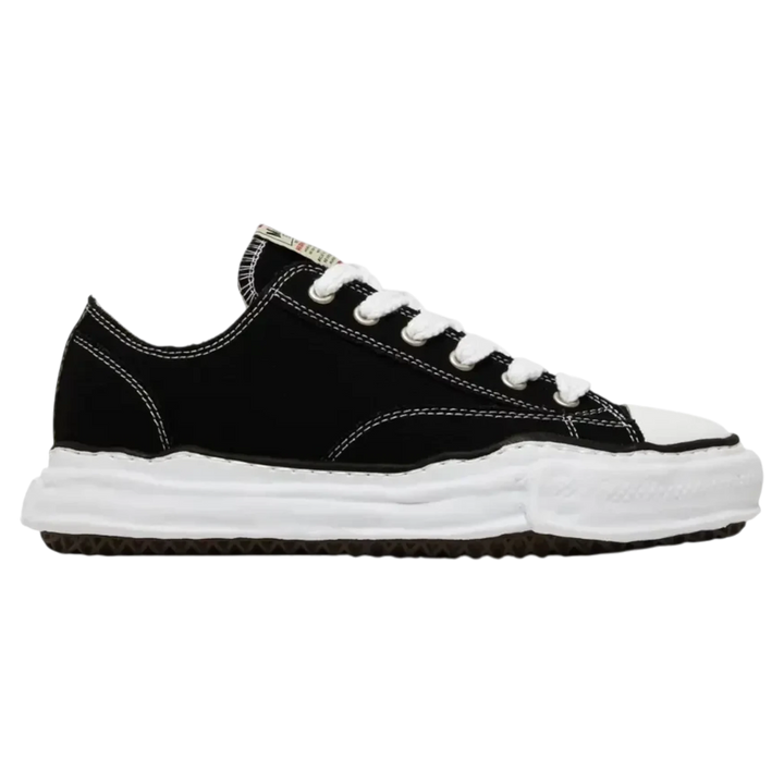 Maison Mihara Yasuhiro Peterson OG Sole black canvas low-top sneakers with white stitching and a chunky white rubber sole.