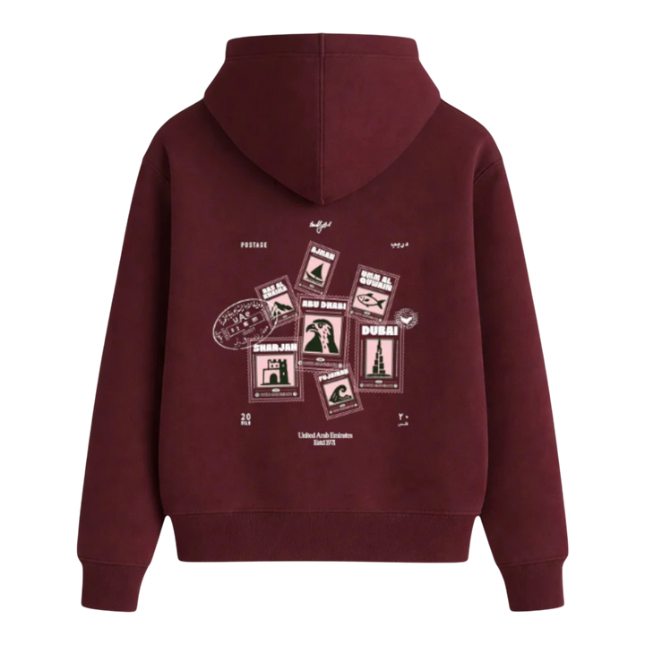 HypeSelection maroon cotton blend hoodie with UAE postage stamp graphics, featuring landmarks and cultural symbols.