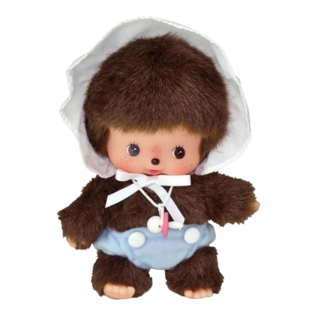 HypeSelection Monchhichi Babychhichi Boy S plush doll with brown fur, blue diaper, and white bonnet. Iconic thumb-sucking pose.
