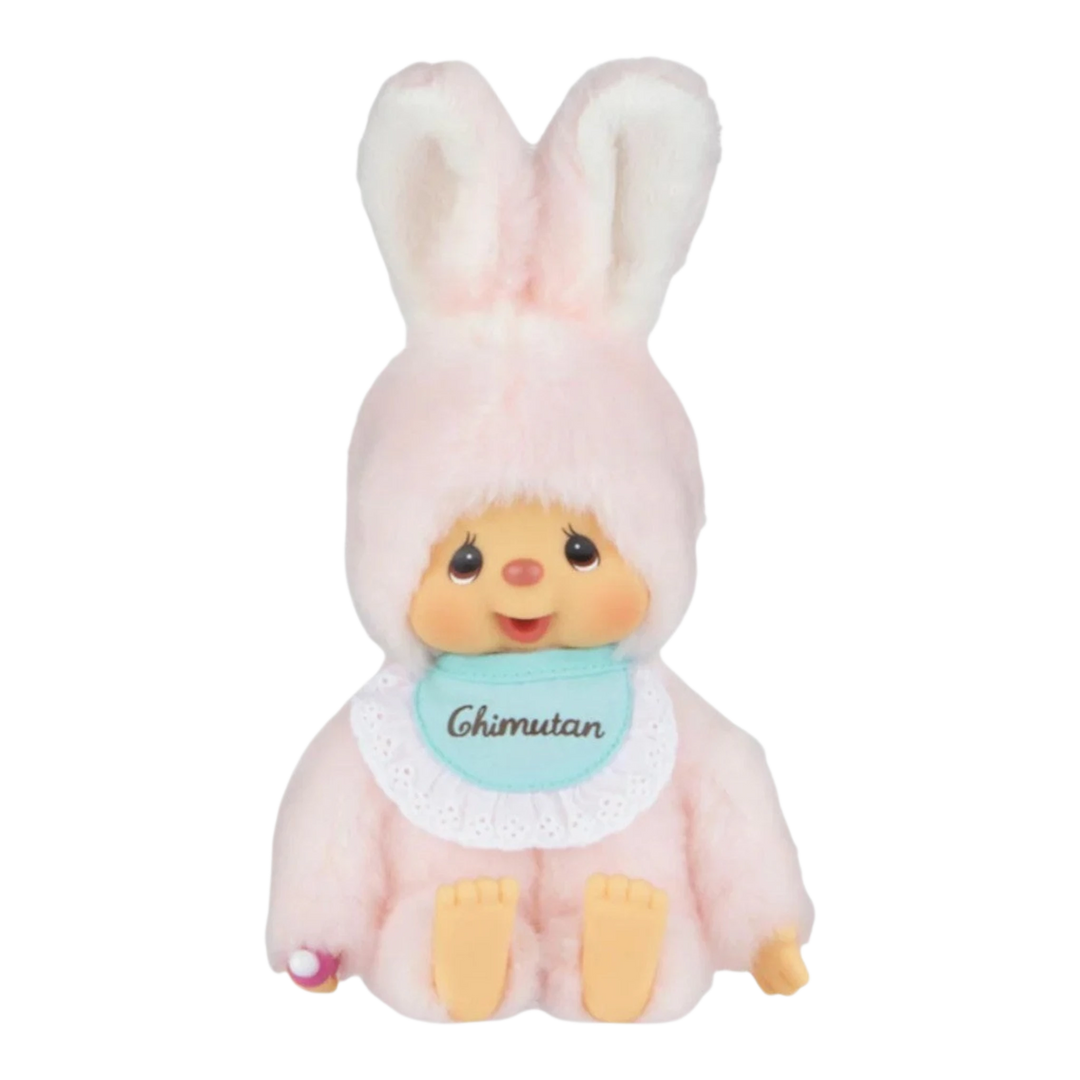 HypeSelection Monchhichi Chimtan S plush doll, a pastel pink rabbit with a mint green bib and pacifier.