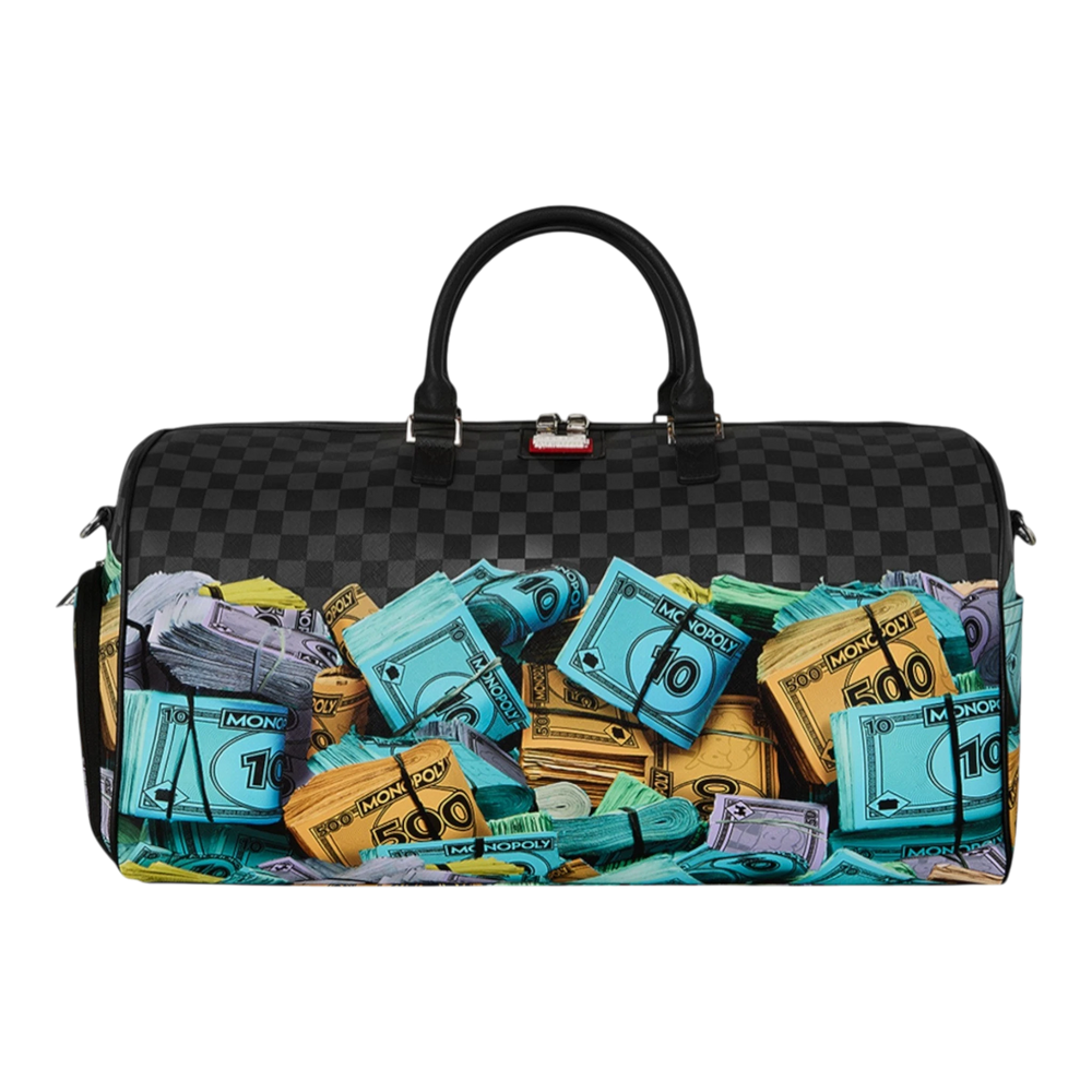HypeSelection duffle bag with all-over Monopoly money stacks graphic print, black checkered pattern, and dual handles.