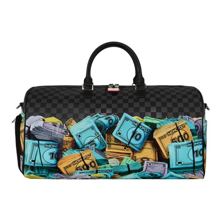 HypeSelection duffle bag with all-over Monopoly money stacks graphic print, black checkered pattern, and dual handles.