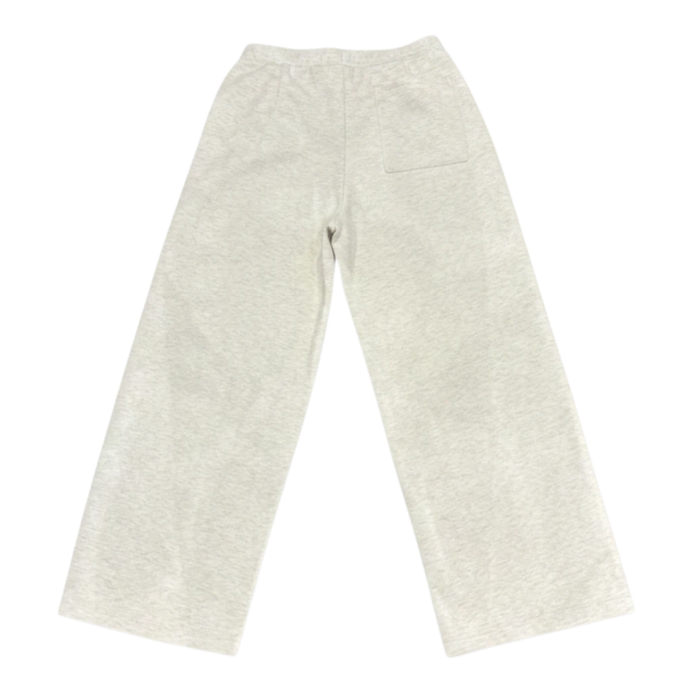 HypeSelection:C Natural sweat straight pants made from a cotton-blend fabric with a soft polyester lining and elastic waistband.
