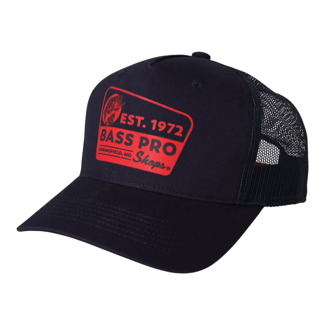 HypeSelection navy blue trucker cap with a vintage Bass Pro Shops patch featuring a leaping bass and "Est. 1972" detail.