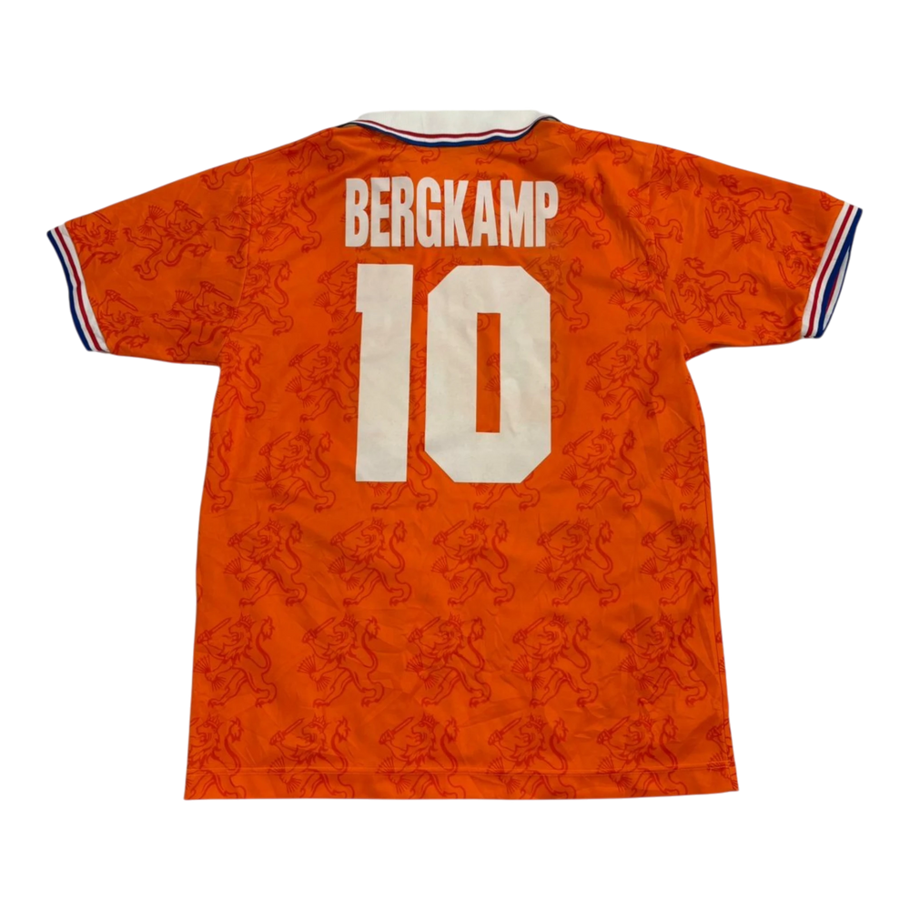Vintage HypeSelection Netherlands Bergkamp 10 jersey in orange with a tonal lion pattern and red, white, blue trim.