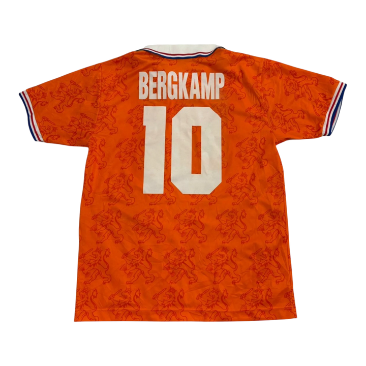 Vintage HypeSelection Netherlands Bergkamp 10 jersey in orange with a tonal lion pattern and red, white, blue trim.