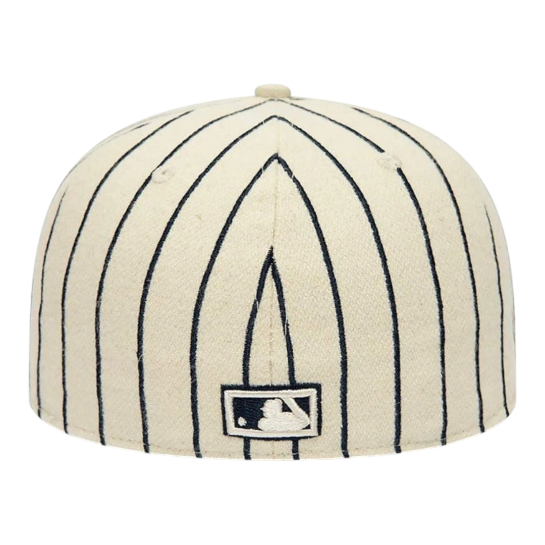 HypeSelection New York Mets cream pinstripe baseball cap with embroidered logo and World Series patch.