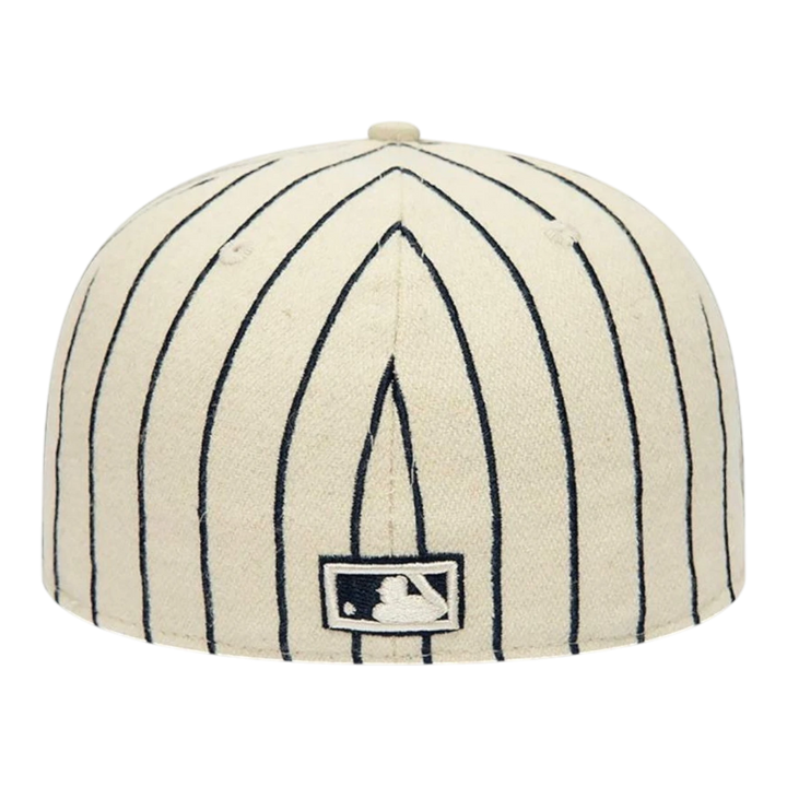 HypeSelection New York Mets cream pinstripe baseball cap with embroidered logo and World Series patch.