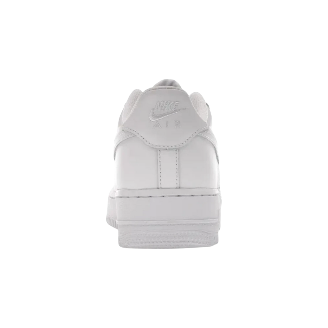 HypeSelection Nike Air Force 1 Low GS Triple White leather sneakers with Air branding on heel.