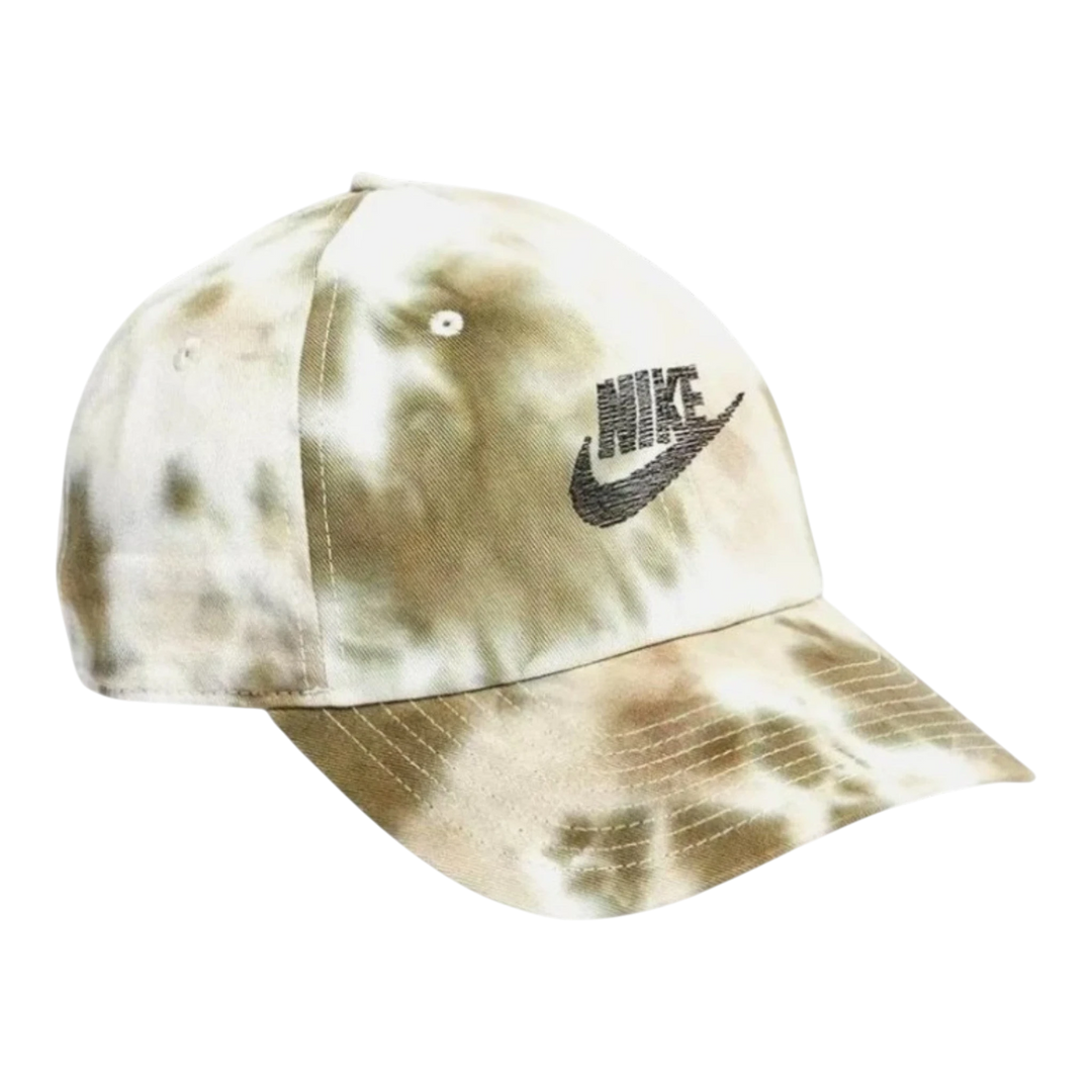 Nike Club unstructured cap in cargo khaki, sail, and neutral olive tie-dye print. Features embroidered Nike logo and pre-curved bill.