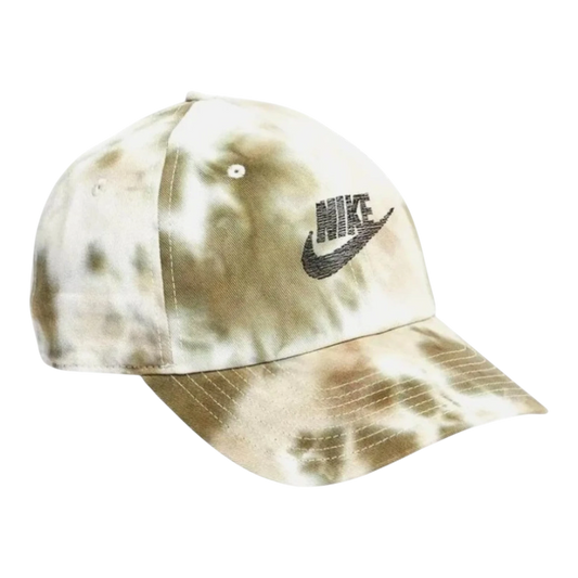 Nike Club unstructured cap in cargo khaki, sail, and neutral olive tie-dye print. Features embroidered Nike logo and pre-curved bill.