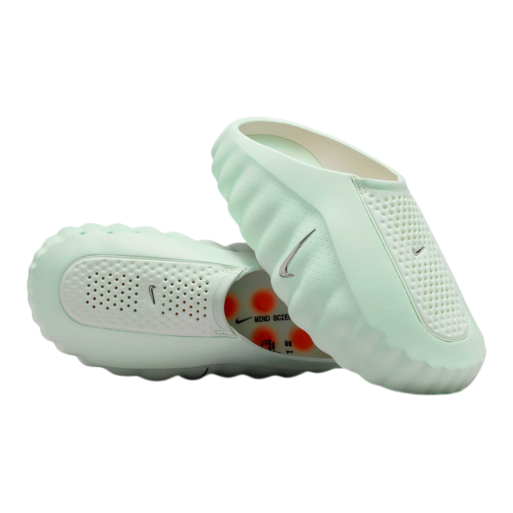 HypeSelection Nike Mind 001 women's slide in Barely Green, featuring a perforated synthetic upper and a unique 22-node foam outsole.
