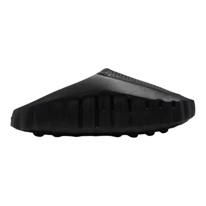 HypeSelection Nike Mind 001 triple black slide featuring a unique foam node sole design for sensory feedback.