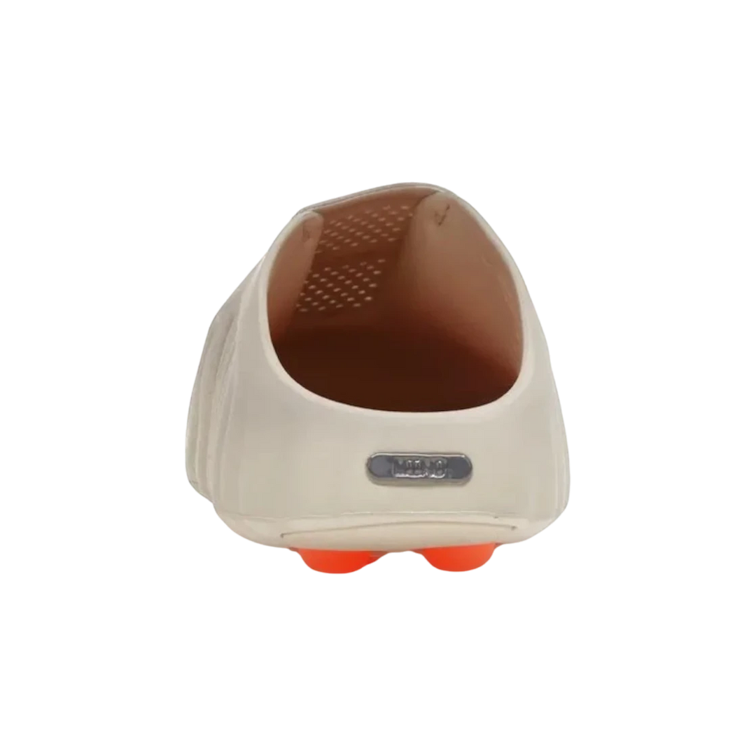 Nike Mind 001 Light Bone slip-on slide with sculpted foam and orange outsole pods.