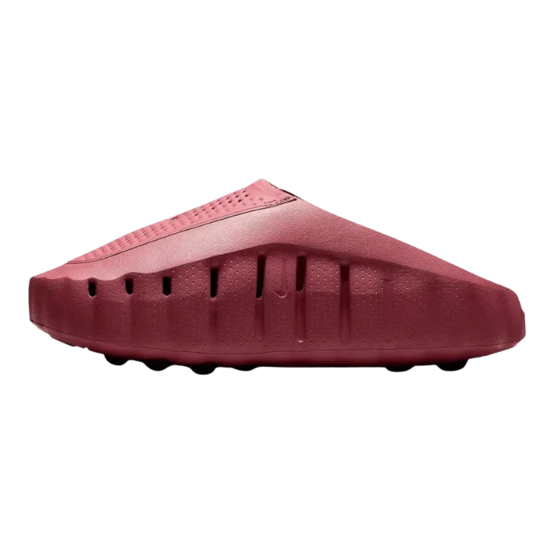 HypeSelection Nike Mind 001 slide in Pink Smoke featuring a sculpted foam silhouette and perforated side detailing.