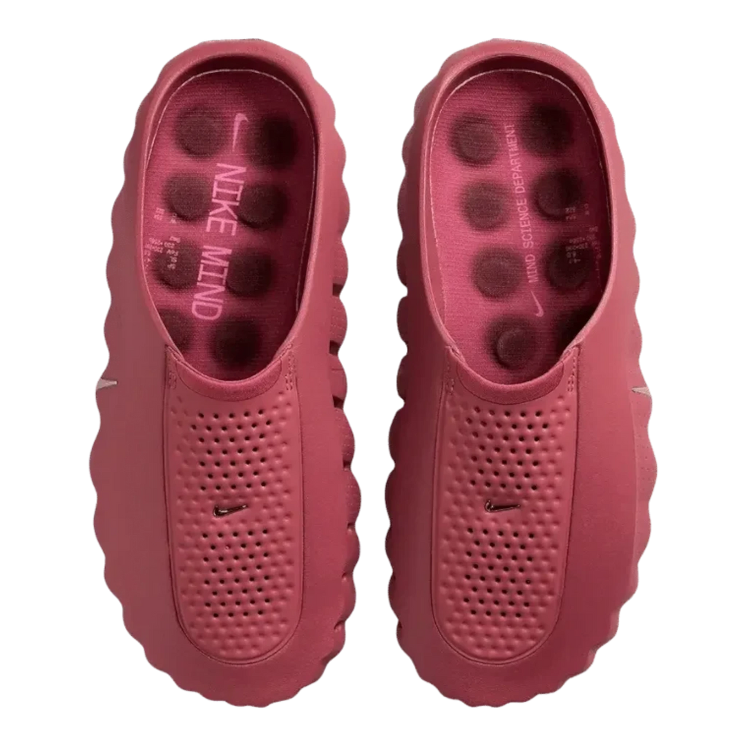 HypeSelection Nike Mind 001 slides in Pink Smoke featuring a sculpted foam silhouette and metallic silver details.