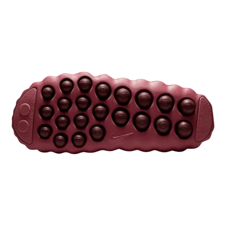 HypeSelection Nike Mind 001 slide in Pink Smoke featuring a sculpted foam outsole with engineered traction pods