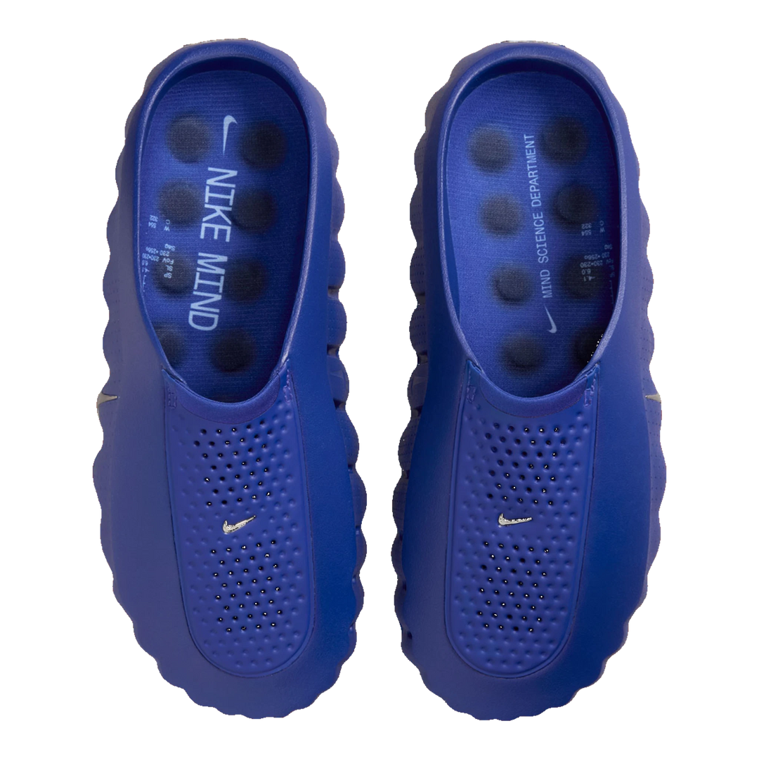 HypeSelection Nike Mind 001 slides in Old Royal blue featuring a sculpted foam silhouette and perforated toe box.