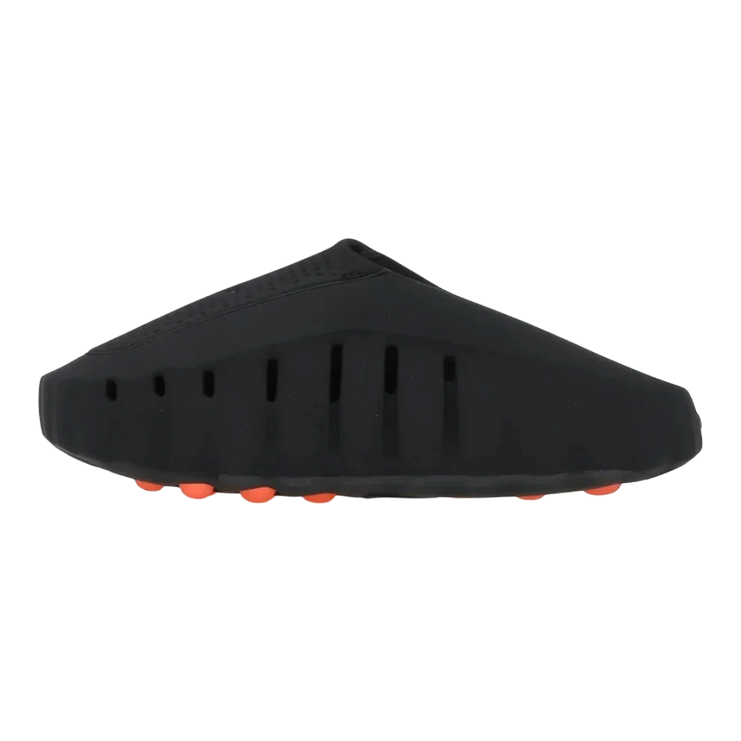 HypeSelection Nike Mind 001 Slide in black foam with orange sole pods and subtle chrome detailing. Women&