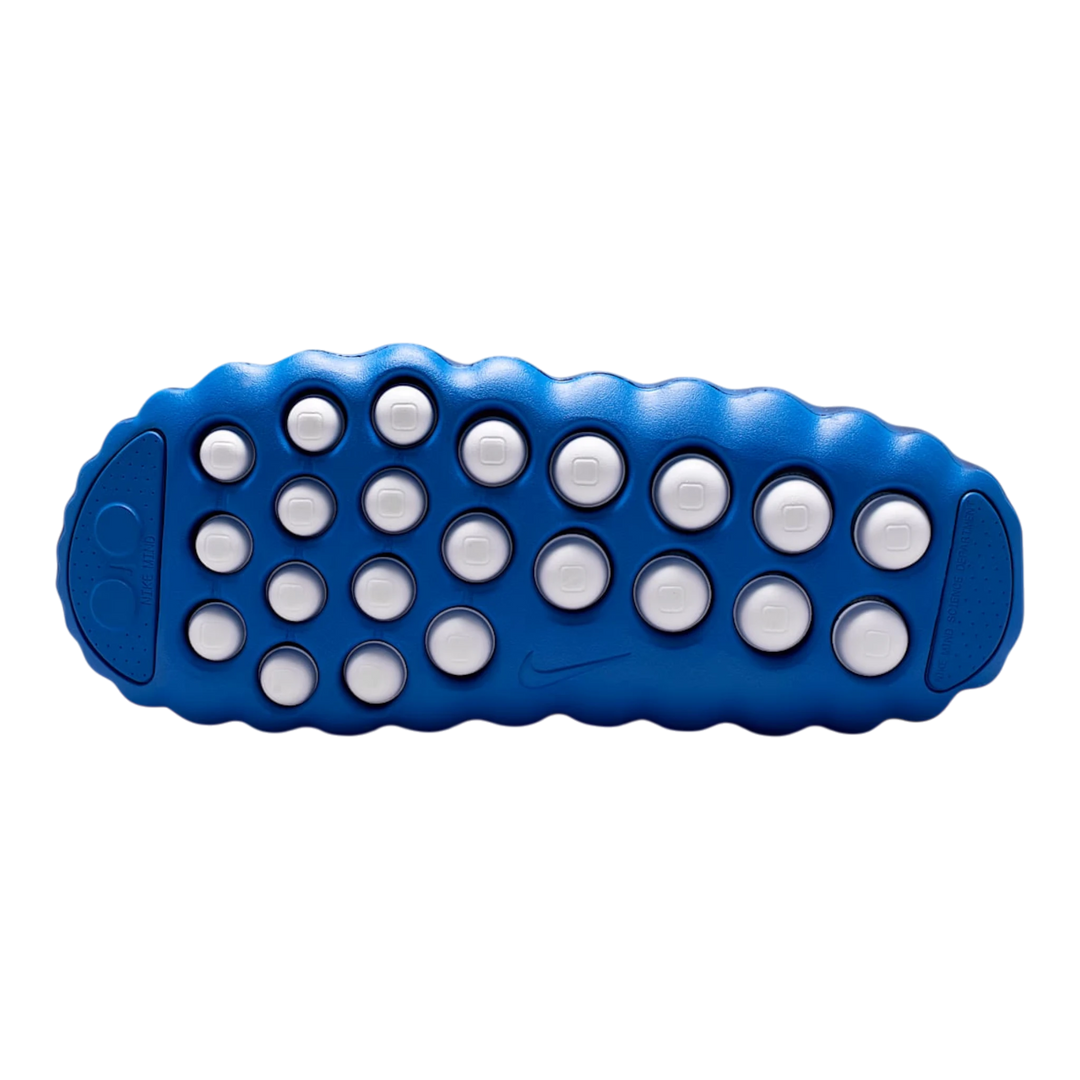 Nike Mind 001 Slide in Blackened Blue and Game Royal foam with a 22-node outsole for sensory stimulation.